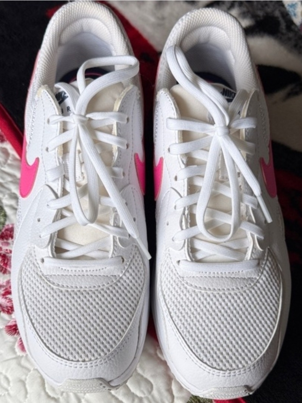 Nike Women’s White Sneakers with Pink Swoosh Accents